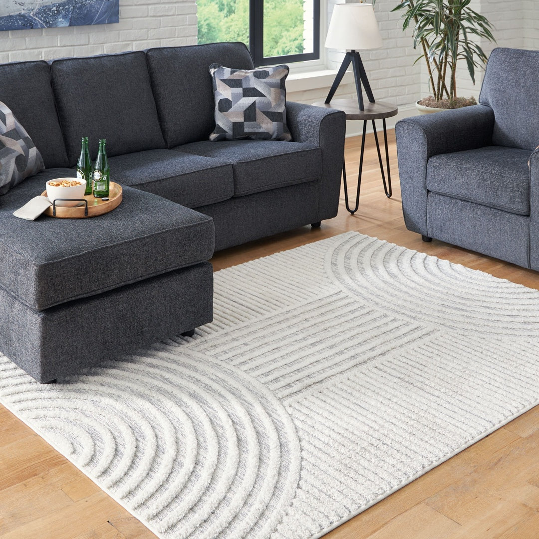 Grey sofa with rug online